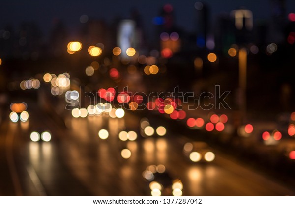 City traffic lights blurred round shapes great colors\
contrast pastel abstract round side by side perfect background\
image night lights traffic lights different interesting amazing buy\
now. 