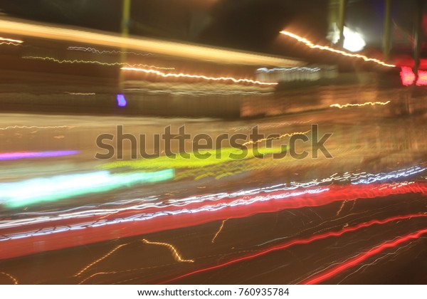 City Traffic Lights Trail at Night Time\
Abstract Background. Blurred Colorful City Center Street, Bokeh\
View with Car Light Pattern and Outdoor Signs. Shiny Colorful\
Lifestyle Beautiful Dark\
Wallpaper
