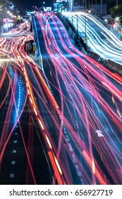 City Traffic Night Blurred With Light Trails