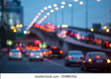 City traffic night blurred on purpose.