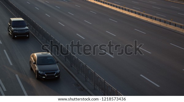 City traffic. The route for the movement of cars,\
highway, visas from a height. Cars Drive at high speed. Copy space\
for text.