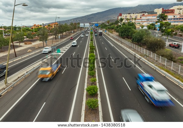 City traffic. The route for the movement of cars,\
highway, visew from a height. Cars Drive at high speed.. Copy space\
for text.