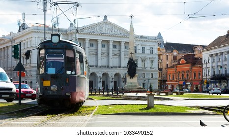 City tram running near State Theater in Arad, Romania