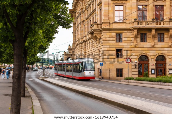 City transport in Prague. Tram on\
the street of the old city. Prague / Czechia -\
05.21.2019