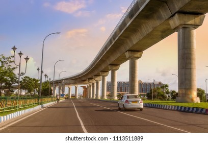 City Under Construction Over Bridge With Highway Road At Sunrise. Photograph Shot At Rajarhat Area Of Kolkata, India.