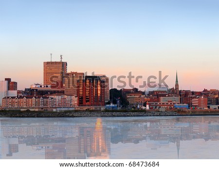 City view of dowtown area of Saint John, New Brunswick, Canada with reflection in the evening at sunset