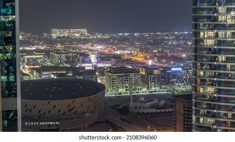 City Walk District Night Timelapse From Above, New Urban Area In Dubai Downtown. Residential Buildings And Shopping Zone Aerial View With Arena And Mosque