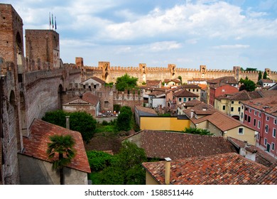 City wall of the town of Montagnana, Padua, in northern Italy, The medioeval fortification surraunds all the old historical city - Shutterstock ID 1588511446