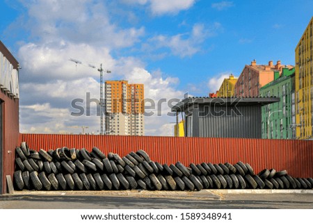 in the city a waste tire dump pollutes the environment