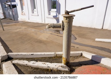 City Water Supply System. Water Pump On The Street Of The City.