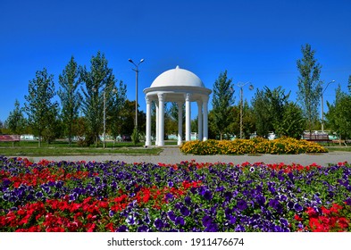 city ​​square with a white-stone gazebo with bright flower beds. Ust-Kamenogorsk Kazakhstan. - Shutterstock ID 1911476674