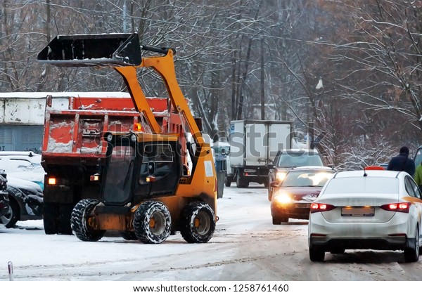 In the city of winter. Snow. All forces are\
thrown on snow removal. Special snowplows went to the streets to\
work. Problems of snow\
removal.