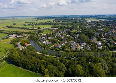 The City of Woerden from above, with the old Rhine river and some farm lands.