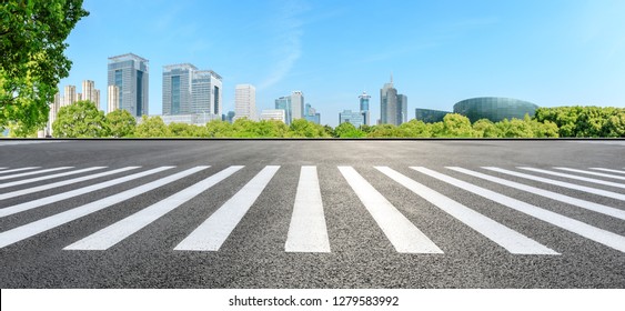 City Zebra Crossing Road And Modern Commercial Buildings In Shanghai