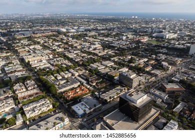 Cityscape aerial view of buildings, homes and streets along Wilshire Blvd in Santa Monica, California.