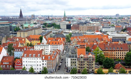 Cityscape, aerial view of old town from the observation deck at the top of the Church of Our Saviour, cloudy weather, Copenhagen, Denmark