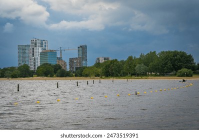 Cityscape of Almere Poort, waterfront with a view on modern high rise buildings - Powered by Shutterstock