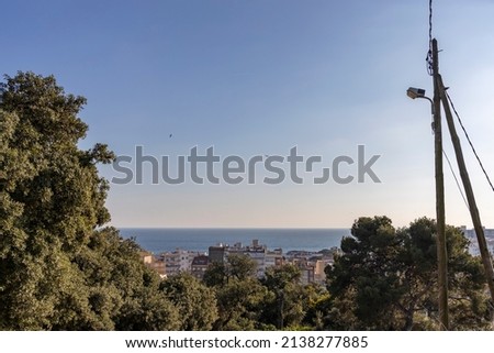 Similar – Panorama von Barcelona mit Büschen im Vordergrund und Sagrada Familia