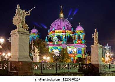 Cityscape of Berlin downtown colorfully illuminated at night during Festival of Lights, Berlin, Germany
