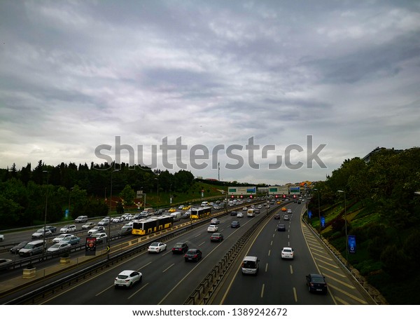 Cityscape of cars on the\
road seen from Halicioglu metrobus station, Istanbul, Turkey,\
05.05.2019