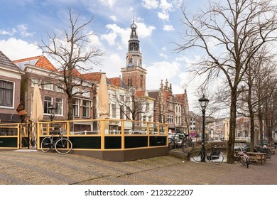 Cityscape of the center of Alkmaar with the tower of the weigh house in the background.