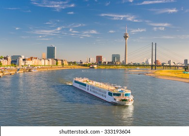 Cityscape Of Dusseldorf Over The Rhine River In A Sunny Summer Day