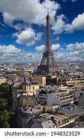 Cityscape and the Eifel Tower in Paris, France, seen from the top of the Arc de Triiomphe