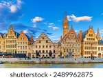 Cityscape of Ghent old town, Graslei Grass Quay with row of historical buildings guild houses on bank of Lys river embankment in Ghent city historic center, East Flanders, Flemish Region, Belgium