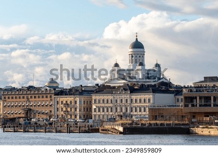 Cityscape of Helsinki. Finnish architecture. Embankment of Finnish capital. Dome of church of st. Nicholas. Cityline Helsinki. Tour to Finland. Helsinki on summer day. Vacation in Finland