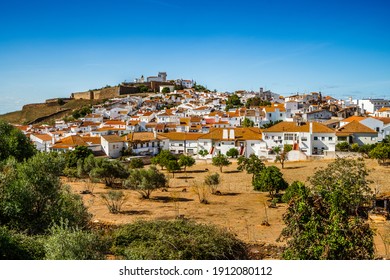 Cityscape of historic town with castle, Estremoz, Alentejo. Portugal - Shutterstock ID 1912080112