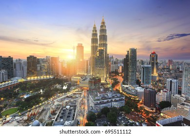 Cityscape image of Kuala Lumpur, Malaysia during sunset.