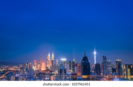 Cityscape of Kuala lumpur city skyline at night in Malaysia. - Shutterstock ID 1037961451