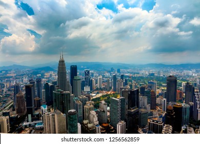 Cityscape of Kuala Lumpur. Cloudy day - Shutterstock ID 1256562859