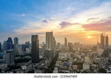 Cityscape of modern buildings and urban architecture. Aerial view of Bangkok city at twilight sunset in Thailand - Shutterstock ID 2159647409