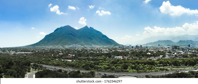 Cityscape of Monterrey Nuevo Leon Mexico sunny day blue sky Cerro de la silla - Powered by Shutterstock