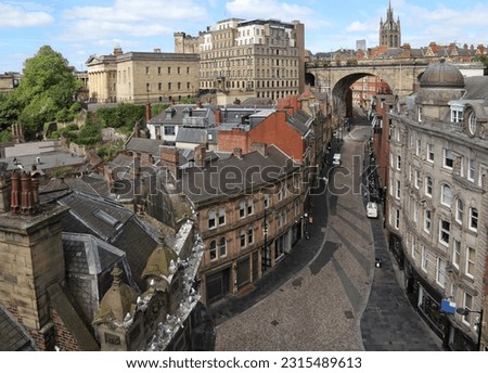 Cityscape of Newcastle, UK. Historical buildings and tower of the cathedral.