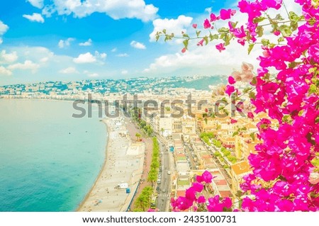cityscape of Nice with beach and sea, cote dAzur, France, with flowers, toned