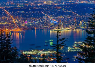 Cityscape Night. Evening Illumination In Vancouver, Canada. Aerial View.