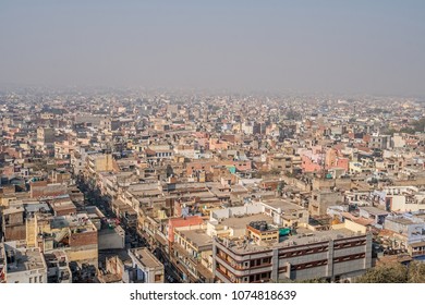 Cityscape Of Old Delhi In India. View Of The Old District Of New Delhi. Pollution And Smog In The Air. Roofs Of Low-income Poor House