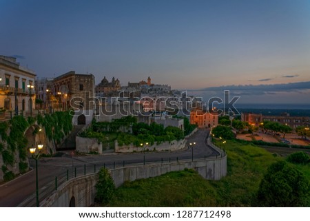A cityscape of Ostuni in Puglia, Italy during sunrise