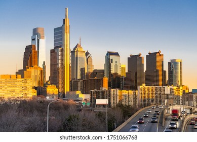 Cityscape Of Philadelphia Skyscraper Skylines Building Sunset With Interstate Highway Urban Road Transportation In Philly City Downtown Of Philadelphia In PA USA. Cityscape Urban Lifstyle Concept.