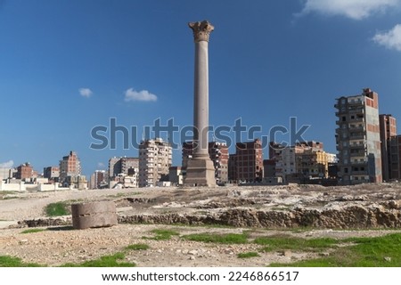 Cityscape with Pompeys Pillar, Alexandria, Egypt. This Roman triumphal column was built in 297 AD