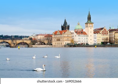 Cityscape of Prague with Old Town, the Charles Bridge and Swans on the Vltava River