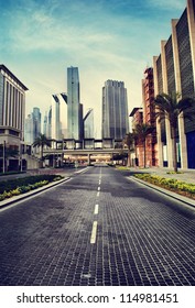 Cityscape in retro style. Dubai downtown street with skyscrapers. Modern road and urban buildings view.