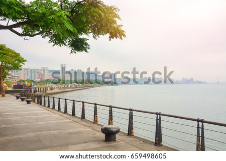 cityscape scene of public park in Taipei downtown at sunset, Tamsui, Taiwan 商業照片 © 