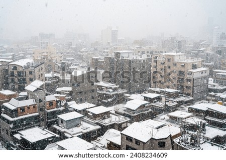 A cityscape of Seoul, South Korea with a big snow