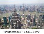 The cityscape of Shanghai with the Jin Mao Tower in the foreground.