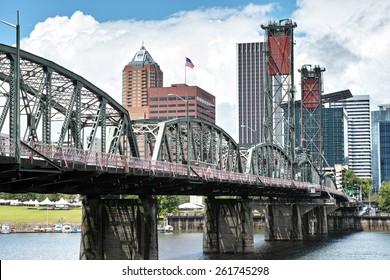 Cityscape Shot Taken In Portland, Oregon Over Looking The Hawthorn Bridge On A Nice Summer Day.