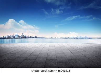 cityscape and skyline of downtown in sunrise day on view from empty floor background