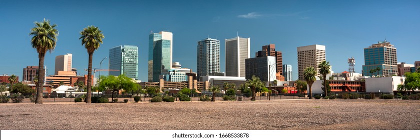 Cityscape skyline panoramic view of office buildings and apartment condominiums in downtown Phoenix Arizona USA